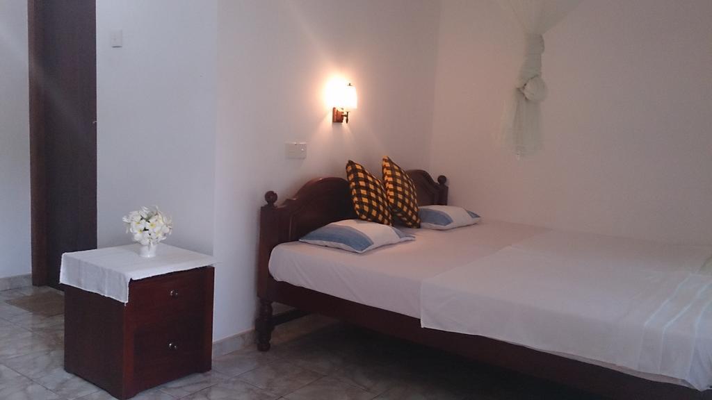 Welcome Family Guest House. Bentota Bilik gambar