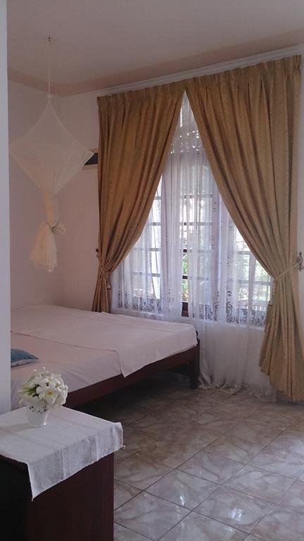 Welcome Family Guest House. Bentota Bilik gambar